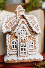 Lighted White Gingerbread House