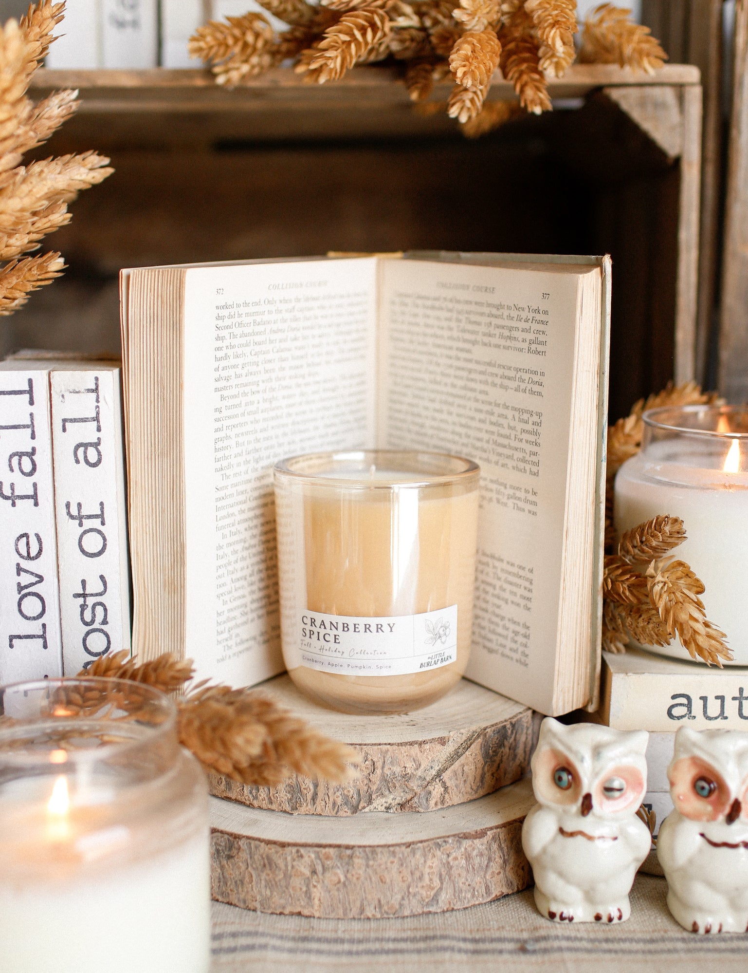 Luxury fall soy candle in elegant champagne glass vessel for seasonal home décor