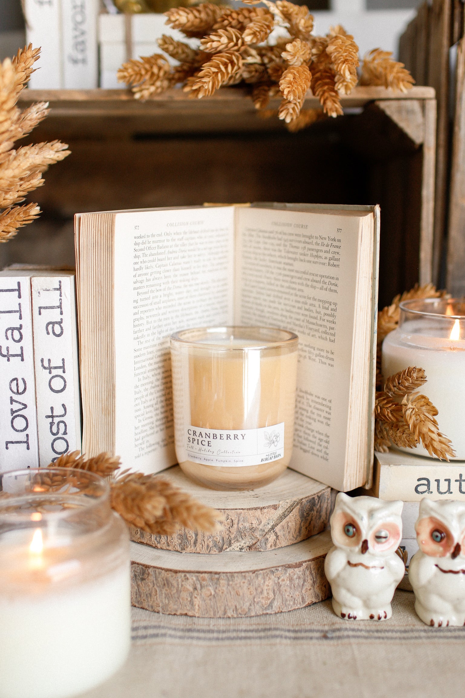 Luxury fall soy candle in elegant champagne glass vessel for seasonal home décor