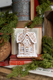 Lighted White Gingerbread House