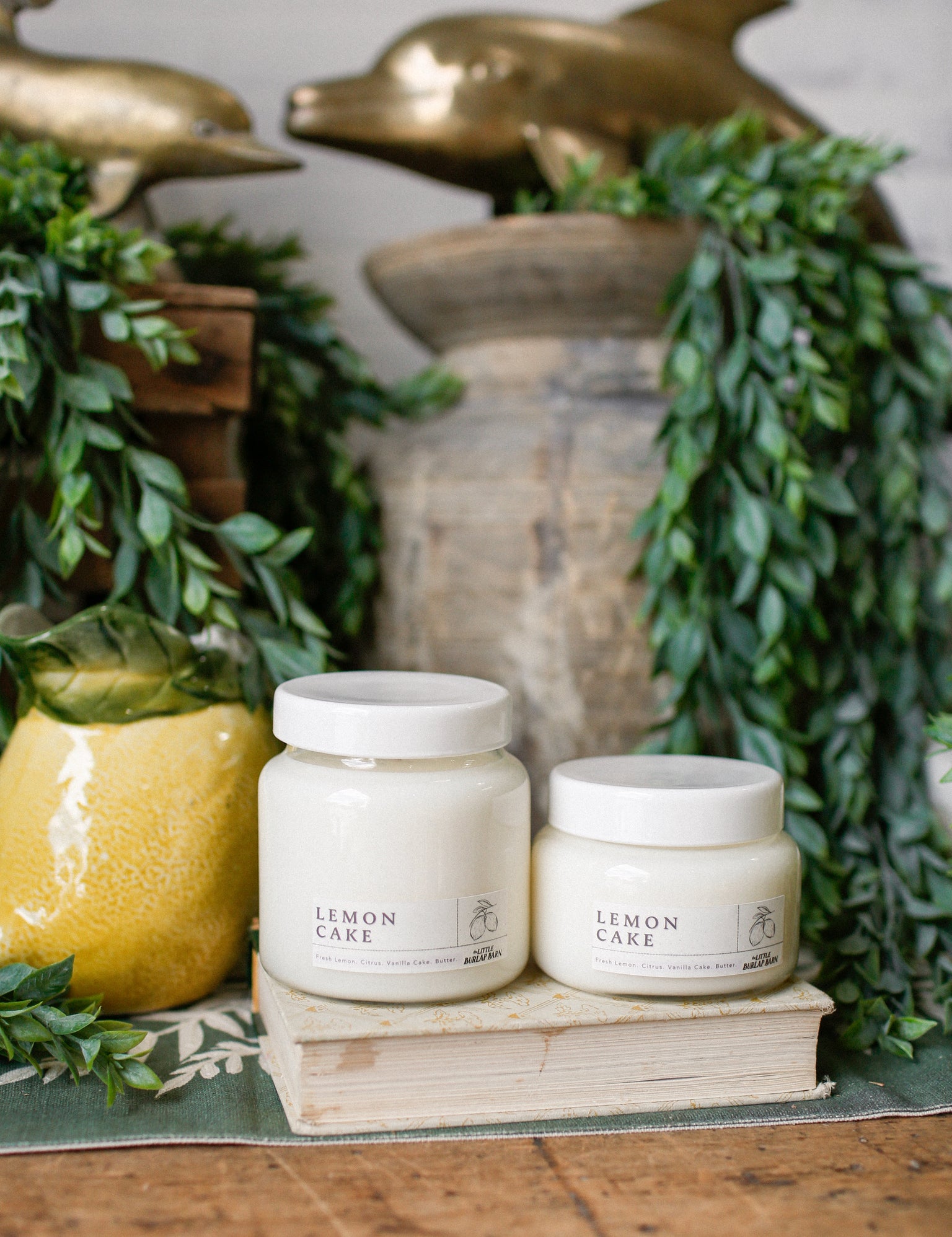 Hand-poured Lemon Cake candle made with 100% USA-grown soy wax in elegant glass jar